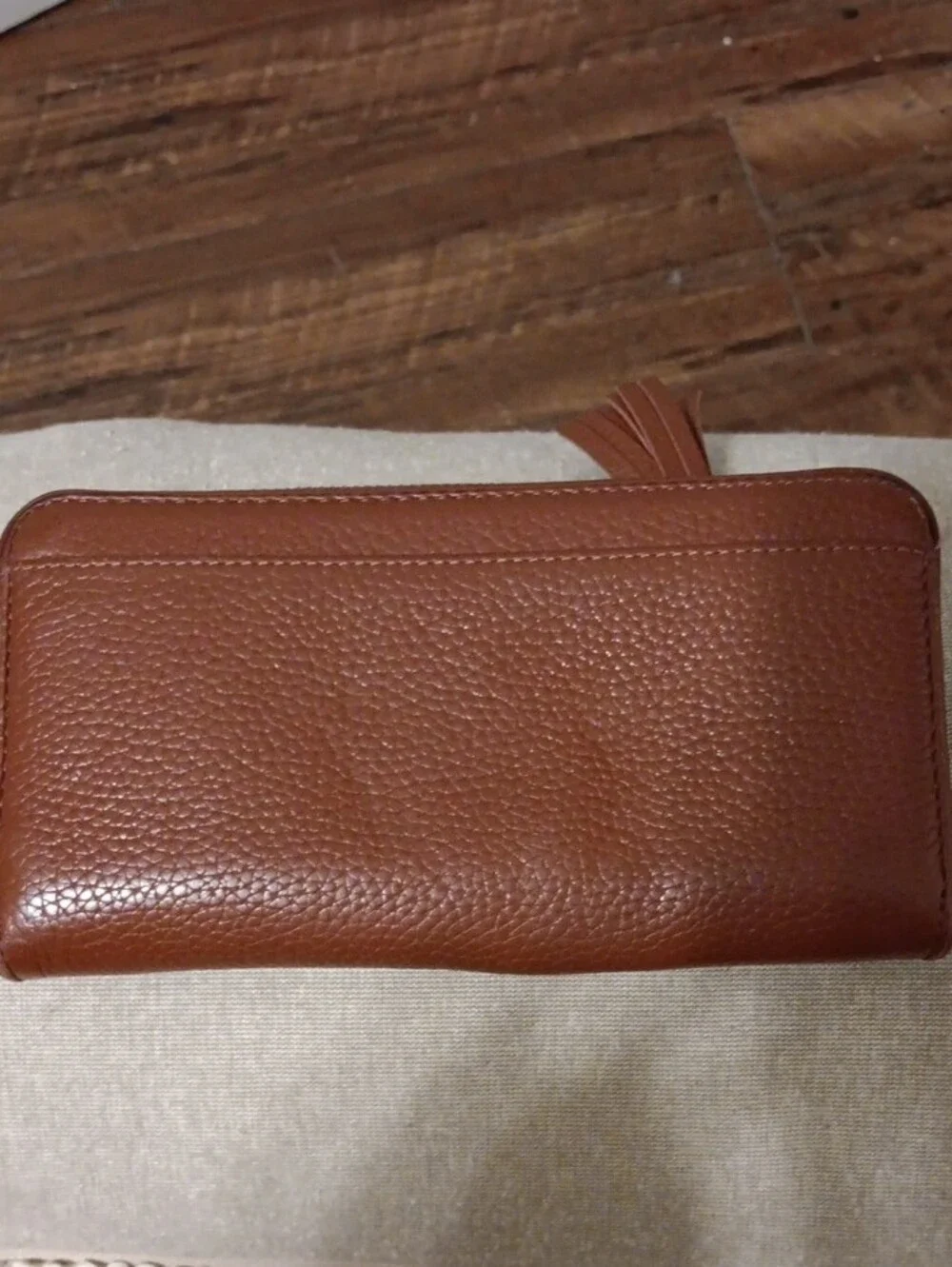 kate spade Brown Tassel Zip Around Leather Wallet
